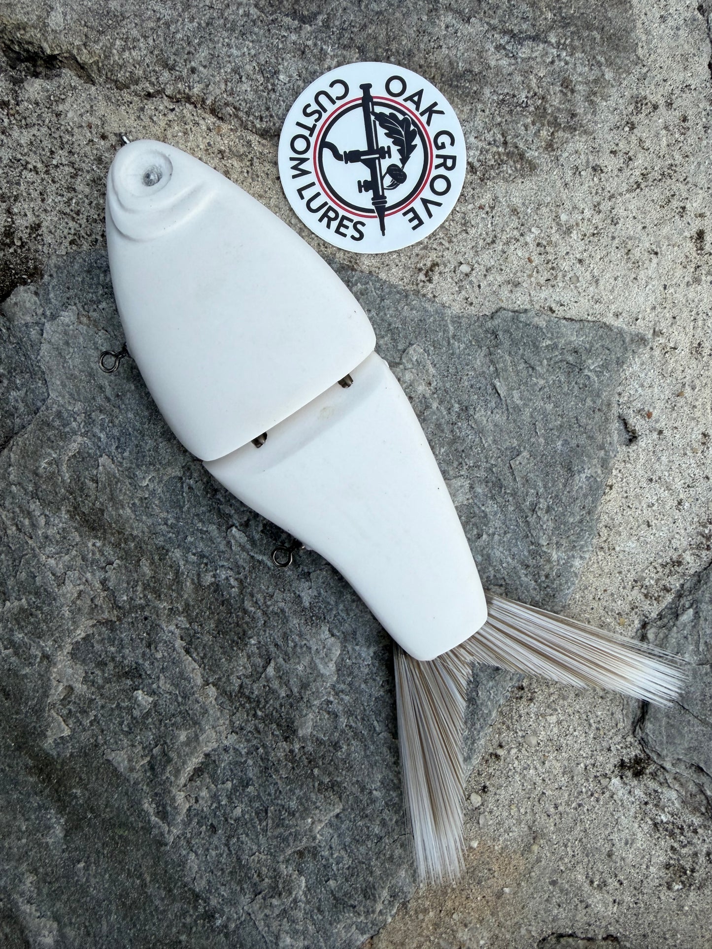 Oak Grove Custom Lures- hand poured Daddy Shad resin swimbait blank is 8-3/4″ long body, 3.8 oz +/-, slow sinking. 2 segments with a soft brush tail. Silent. Turns great on a pause and has a nice S curve on a fast retrieve. Price includes Custom Paint.