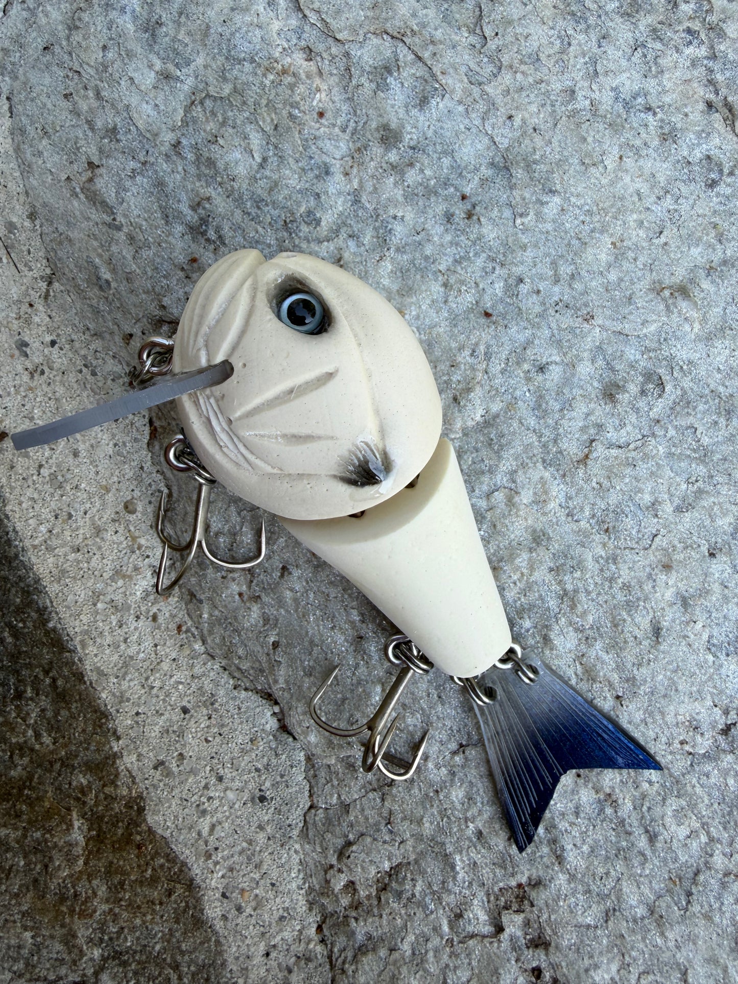 Tater Hog’s Hoochie Baby- Wake Bait 1 oz floating design 4 inches in length. Best used on Medium heavy rod rated to 2 oz with 30 to 50 pound braided line. Tater tips: Retrieve it slow in spring. Fast in fall. - Price includes custom paint