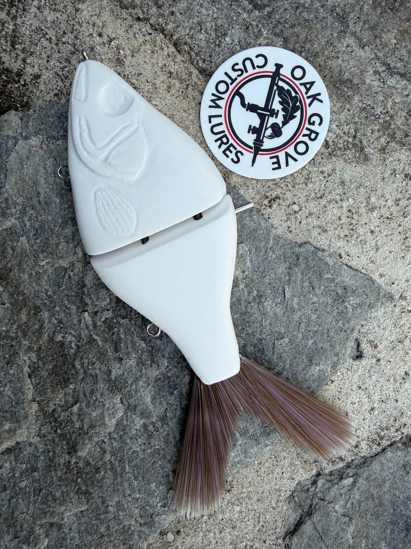 Oak Grove Custom Lures- Crappie resin swimbait blank is 7″ long body, 2.4 oz +/-, slow sinking. 2 segments with a soft brush tail. Silent. Turns great on a pause and has a nice S curve on a fast retrieve. -Price includes Custom Paint