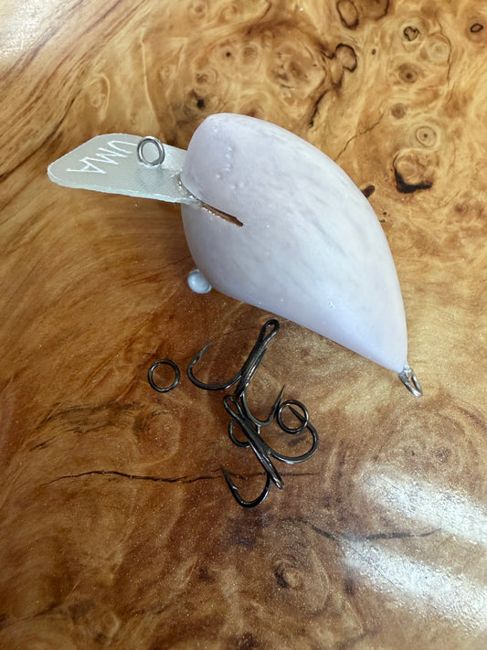 UMA Lure Co. - MDSB: 

Weight- 3/8
Length - 2 
Diving depth- 2-4 ft
The only bait in our lineup with a rattle. Hard thump with a “back out” action when paused, this bait can be fished through the gnarliest cover. 
Price includes custom paint